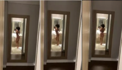 Beatriz Souza gravando o bundão no espelho